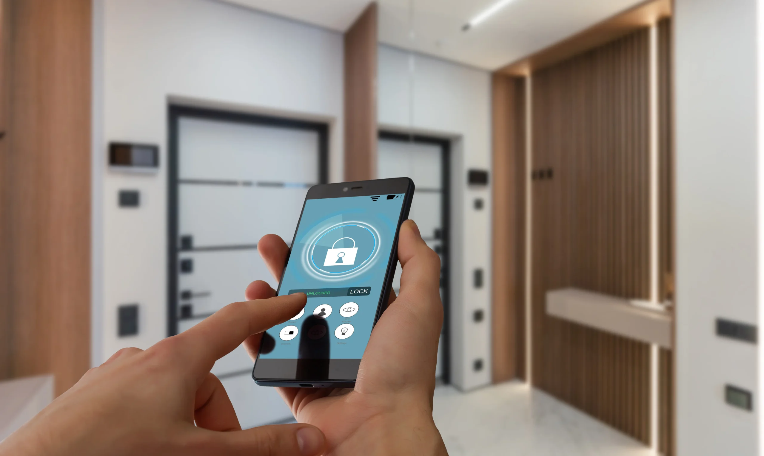 Hands holding a smartphone with a smart home security app interface.